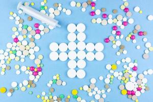 pills on a blue background photo