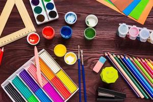 School supplies on a red background photo