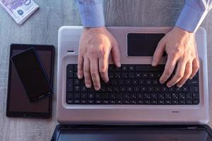 man with laptop photo