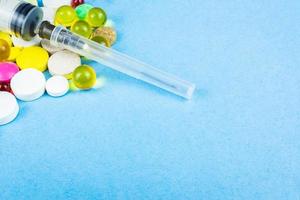 pills on a blue background photo