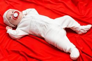 child on a red background photo