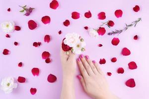 beauty hands with makeup flowers photo