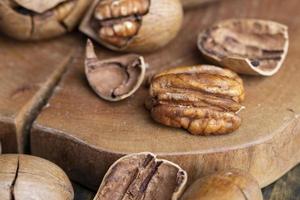 Pecan in a shell on the table photo