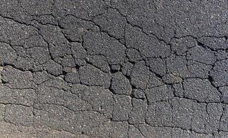 A damaged road dangerous for traffic photo