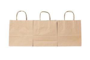 kraft paper ecologic bag on isolated white background photo