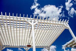 Wooden beach canopy. Natural light. sunbathe. wooden levels against the sky photo