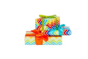 Set of Christmas or other holiday handmade present in colored paper with orange, green and blue ribbon. Isolated on white background, top view. thanksgiving Gift box concept photo