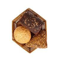 Various types of bread in a basket. Top view photo