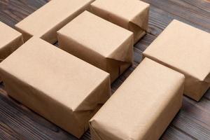 a lot of cardboard box on dark wooden background. top view photo