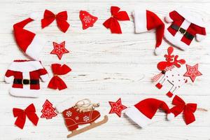 Top view of Christmas decorations and toys on wooden background. Copy space. Empty place for your design. New Year concept photo