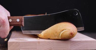 Wheat baguette cut into pieces for making sandwiches photo