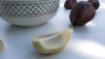 Peeled salak fruit on a white background, Close up 02 photo