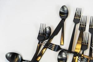 black metal Dinnerware Cutlery Utensils, Forks Knives, Spoons on Gray Background mexcio photo