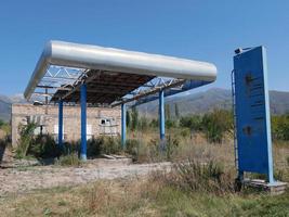 Abandoned gas station in Kyrgyzstan photo