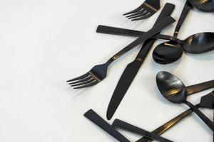 black metal Dinnerware Cutlery Utensils, Forks Knives, Spoons on Gray Background mexcio photo