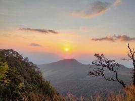 Mountain valley during sunrise. Natural summer landscape photo