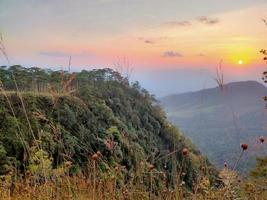 Mountain valley during sunrise. Natural summer landscape photo