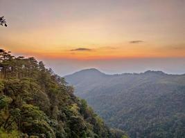 Mountain valley during sunrise. Natural summer landscape photo