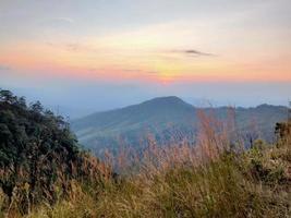 Mountain valley during sunrise. Natural summer landscape photo