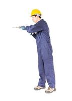 Handyman in unifrom standing with his electric drill photo