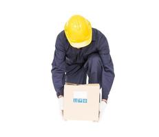 Man in uniform lifting the paper box photo