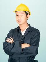 Man in coveralls helmet hardhat photo