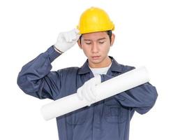 Worker holding blueprint on white photo