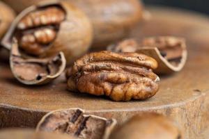 Pecan in a shell on the table photo
