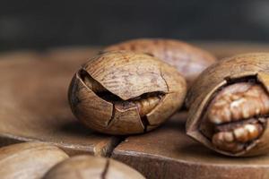 Pecan in a shell on the table photo
