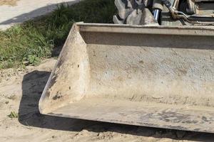 Tractor in the mud during road construction photo