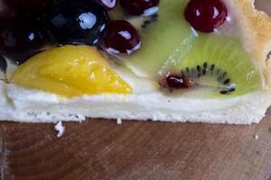 delicious cake with different berries photo