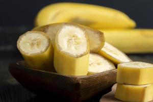 Sliced ripe yellow banana, close up photo