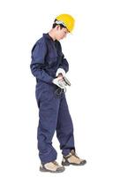 Young handyman in uniform hold grinder photo