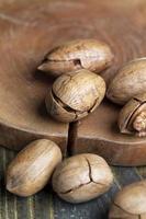 Pecan in a shell on the table photo