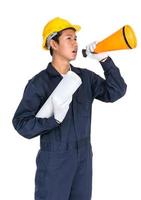 Young worker shouting for announce through a megaphone photo