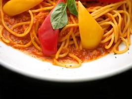 Spagetti decorate with sweet pepper photo