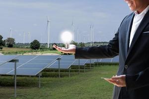 Corporate manager presenting on how to sell electricity from rooftop solar back to the grid. photo