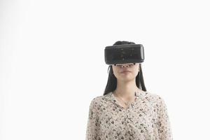 Woman with VR glasses of virtual reality. photo