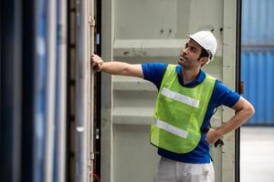 Young logistic worker man wearing worker uniform found out making mistakes at work. photo
