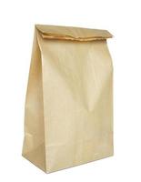 Brown paper bag isolated on white photo