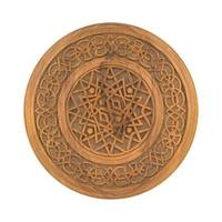 A wooden carved ornamental plate isolated on a white background photo