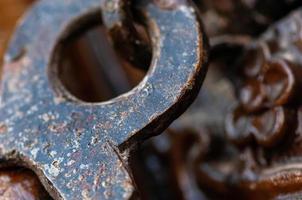 A closeup of a Metal element of a lock on an old door photo