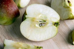 Sliced ripe apple of red color photo