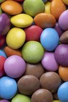 Multicolored chocolates with chocolate filling photo