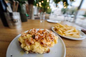 Street food on a plate in a street cafe photo