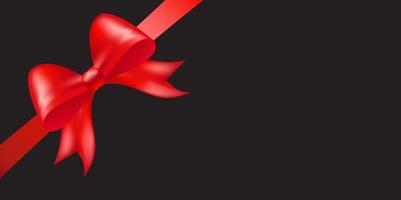 Shiny red color satin ribbon on black background vector