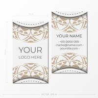 A set of white business cards with an ornament. Print-ready business card design with space for your text and abstract patterns. vector