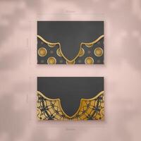 Presentable business card in black with a mandala in gold pattern for your contacts. vector