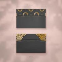 A presentable business card in black with a vintage gold pattern for your contacts. vector