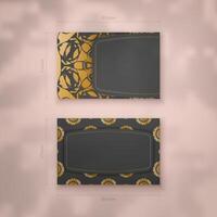 Black business card template with Greek gold pattern for your brand. vector